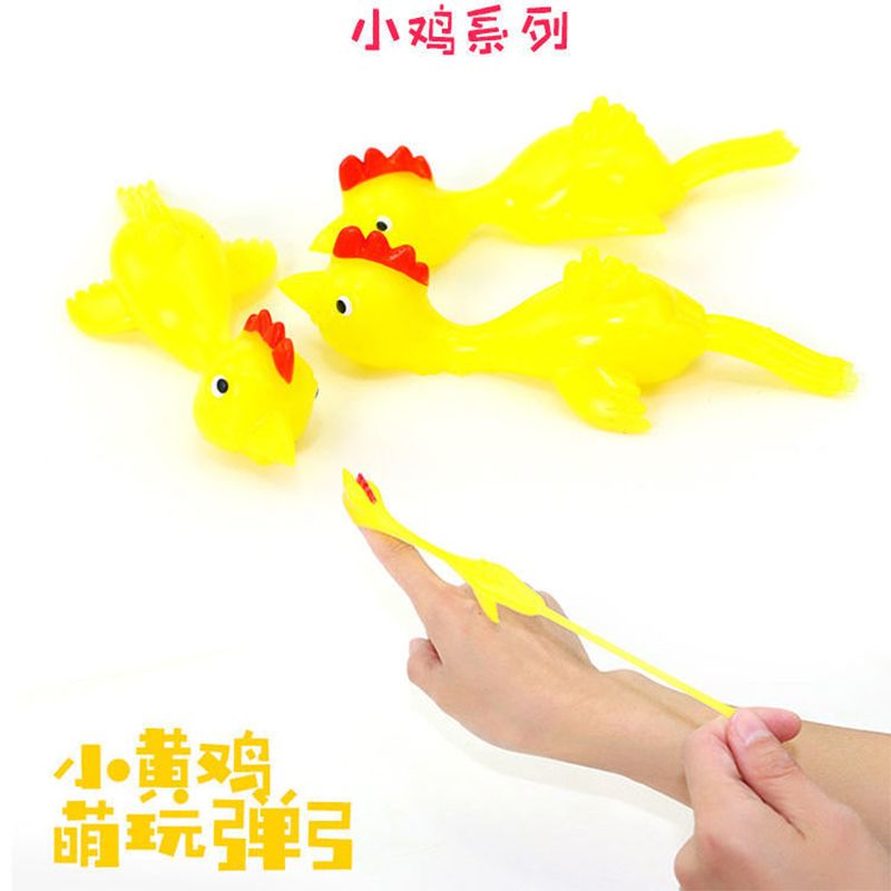A soft rubber toy for the fun prank of shooting chickens is selling well at a chicken stall