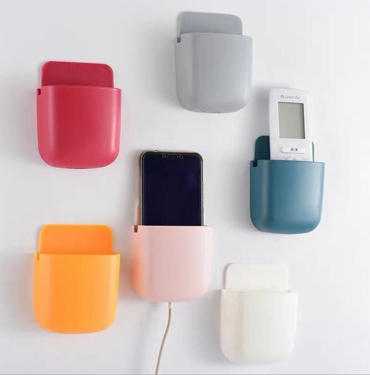 Wall-mounted mobile phone charging stand without holes, remote control storage rack, bedside mobile phone storage box