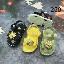 Children sweet summer wear sandals outside