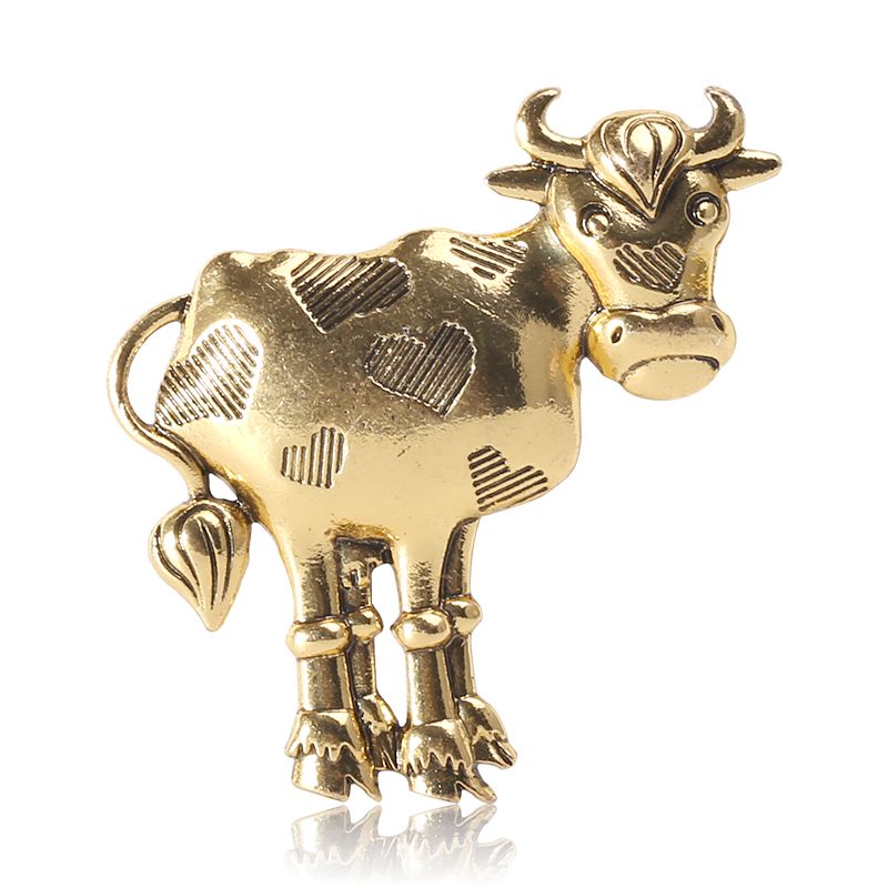 Factory direct sales for foreign trade, popular alloy ancient gold 12 Chinese zodiac ox brooches, simple and versatile clothing accessories Application Scenario