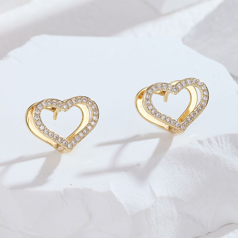 2021 New heart-shaped stone stud earrings for women, simple heart-shaped diamond earrings, fashionable and individual zircon earrings