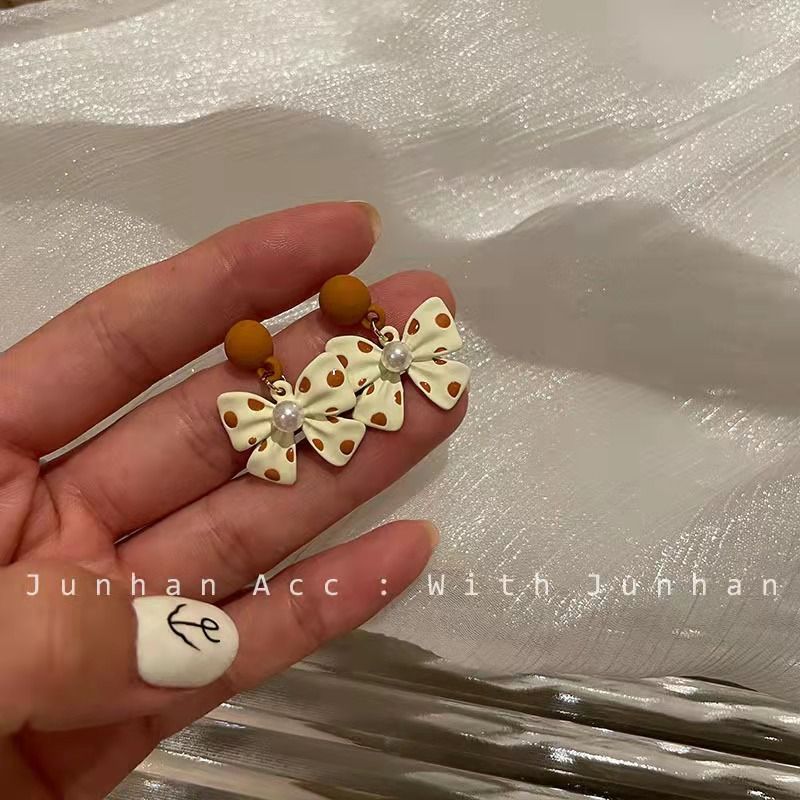 Cartoon polka dot bow earrings