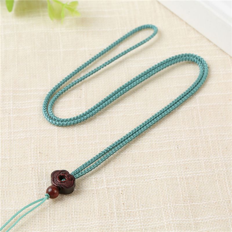 1.5 yuan hand-woven non-adjustable dragon-patterned rope, sandalwood auspicious cloud pendant, hanging rope, necklace rope Application Scenario