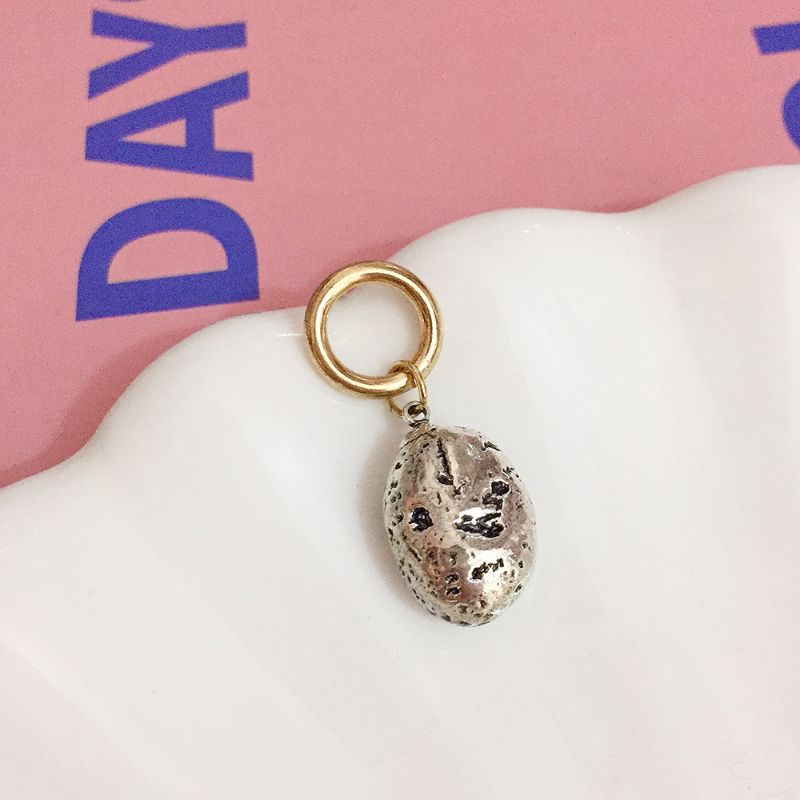 Designer metal circle silver stone earrings with natural texture patterns, small stone circle earrings, fashionable and elegant earrings details Picture