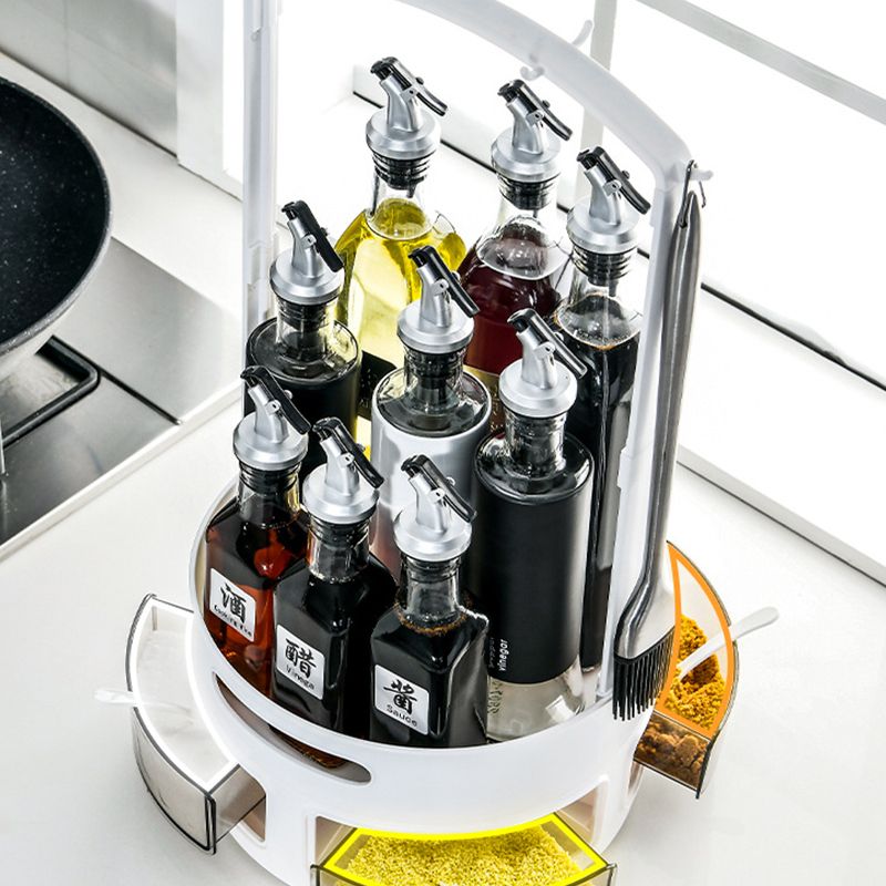 A double-layer storage tray for oil, salt, soy sauce and vinegar bottles, specially designed at the corner of the countertop with a rotatable kitchen seasoning rack Specification drawing