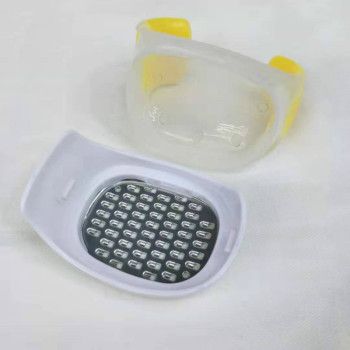 Mini grinder, creative kitchen tool, handheld garlic grinder, portable storage box, garlic and ginger grinder Item Picture