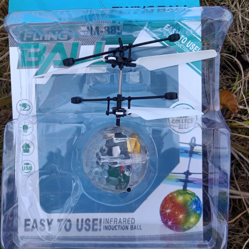 Selling seven-color light crystal ball sensing aircraft remote control aircraft drop suspension charging children's toys Item Picture