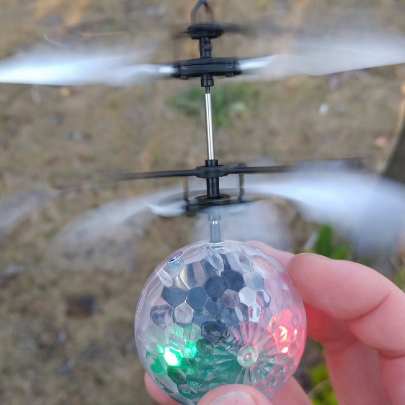 Selling seven-color light crystal ball sensing aircraft remote control aircraft drop suspension charging children's toys details Picture