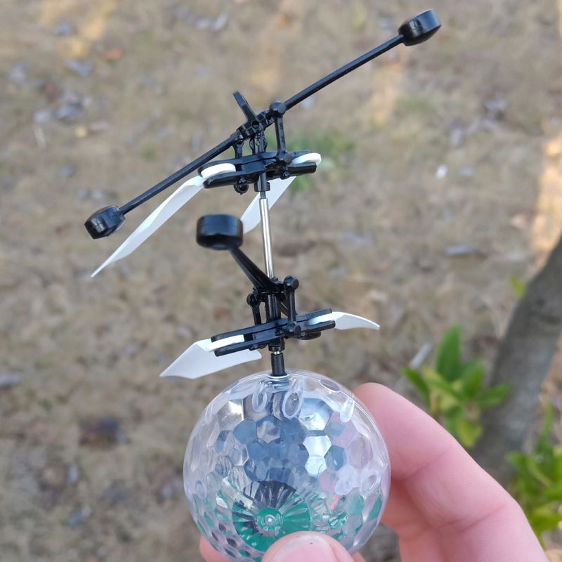 Selling seven-color light crystal ball sensing aircraft remote control aircraft drop suspension charging children's toys Application Scenario