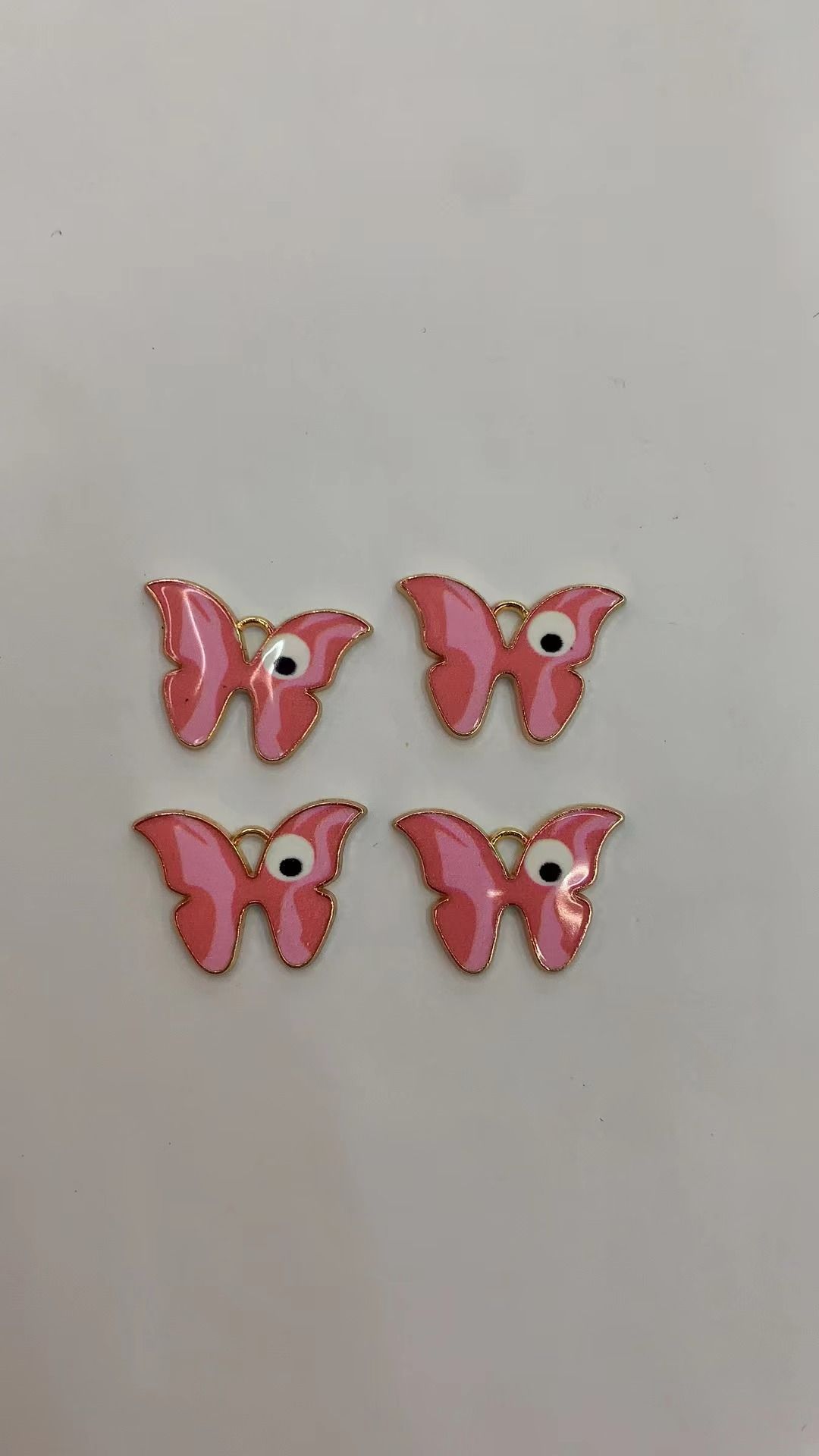 Alloy butterfly with eyes