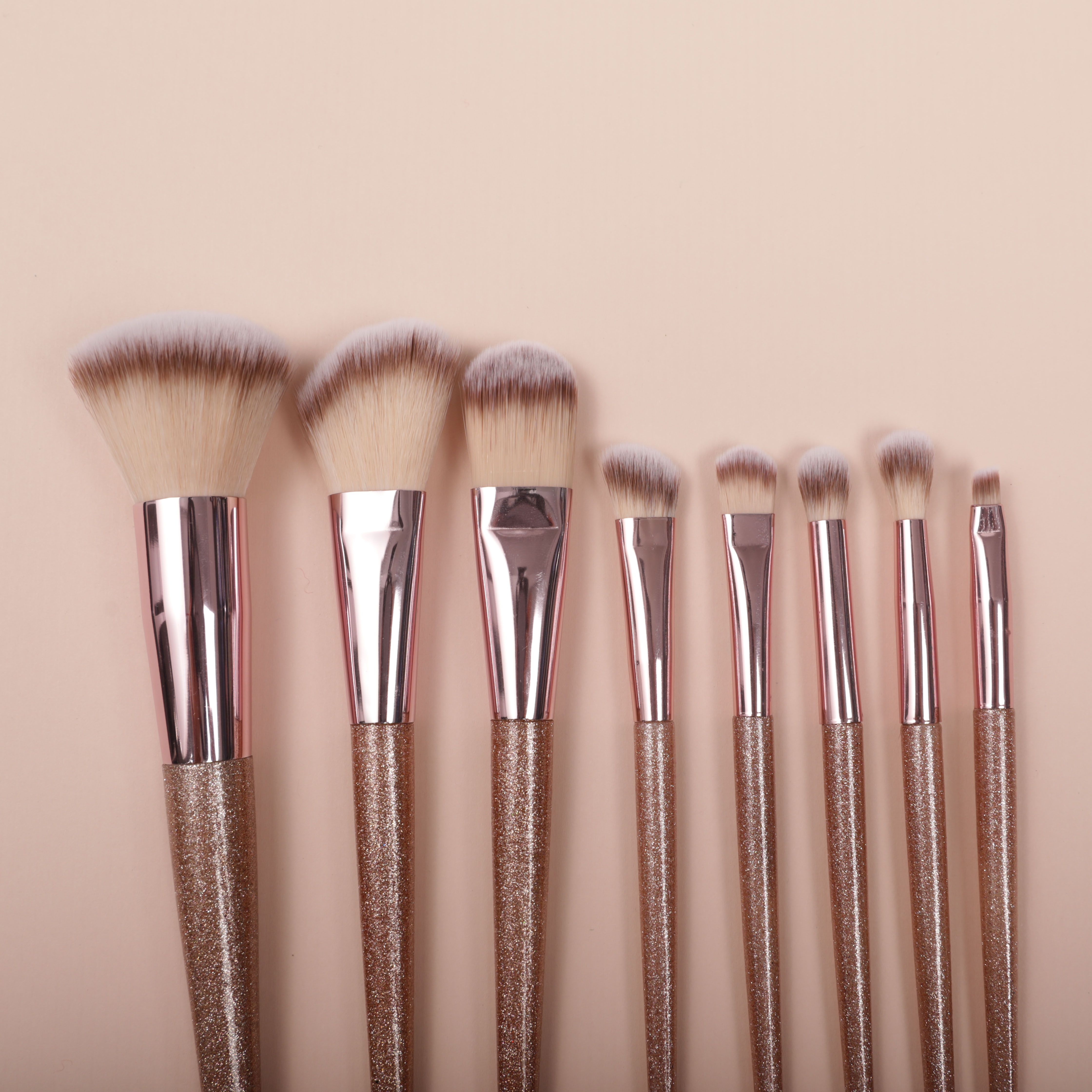 Close-up of onion handle brush and enlarged partial illustration of handbag