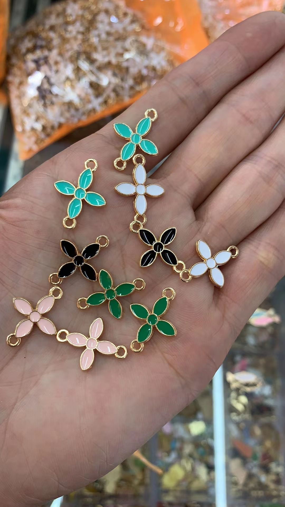Best-selling duck-shaped jewelry accessories, alloy accessories, white claw accessories, bright color accessories, alloy colorful four-petal flowers