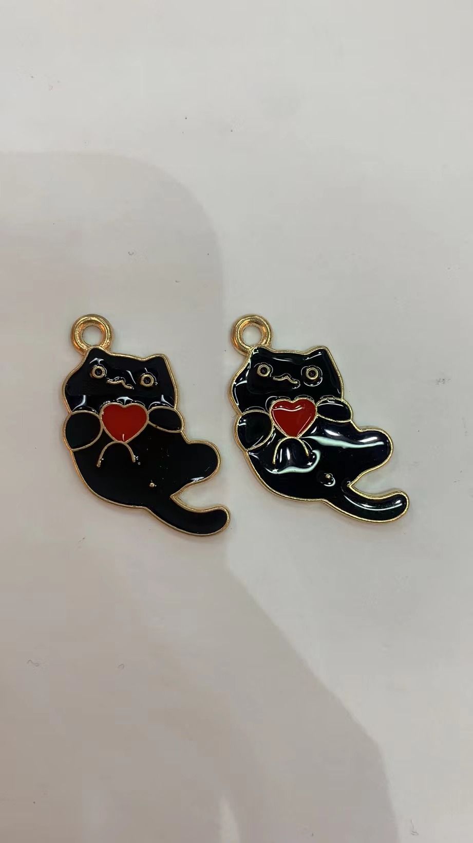 Best-selling duck-shaped jewelry accessories, alloy accessories, white claw accessories, bright color accessories, alloy black cat accessories