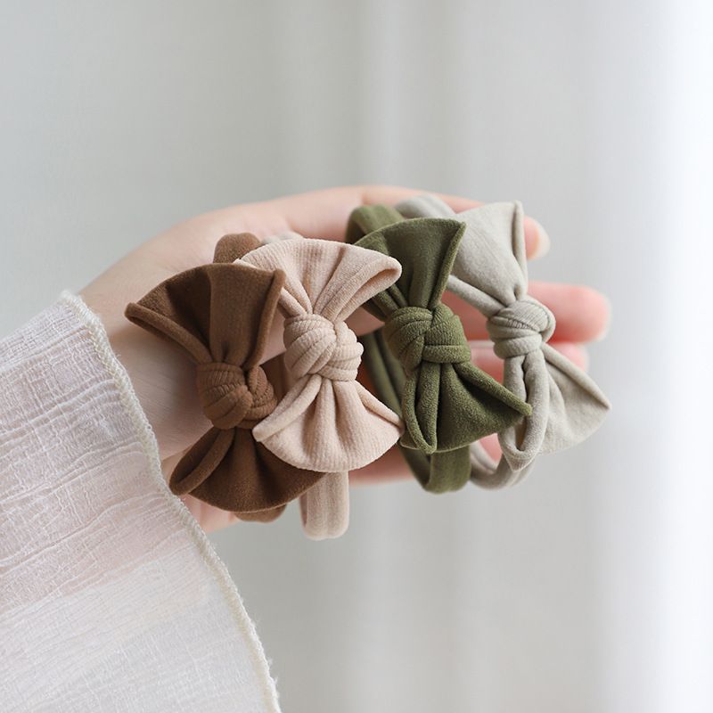Bow leather cover headband New hair ponytail towel circle High elastic durable rubber band headband hair accessories Application Scenario