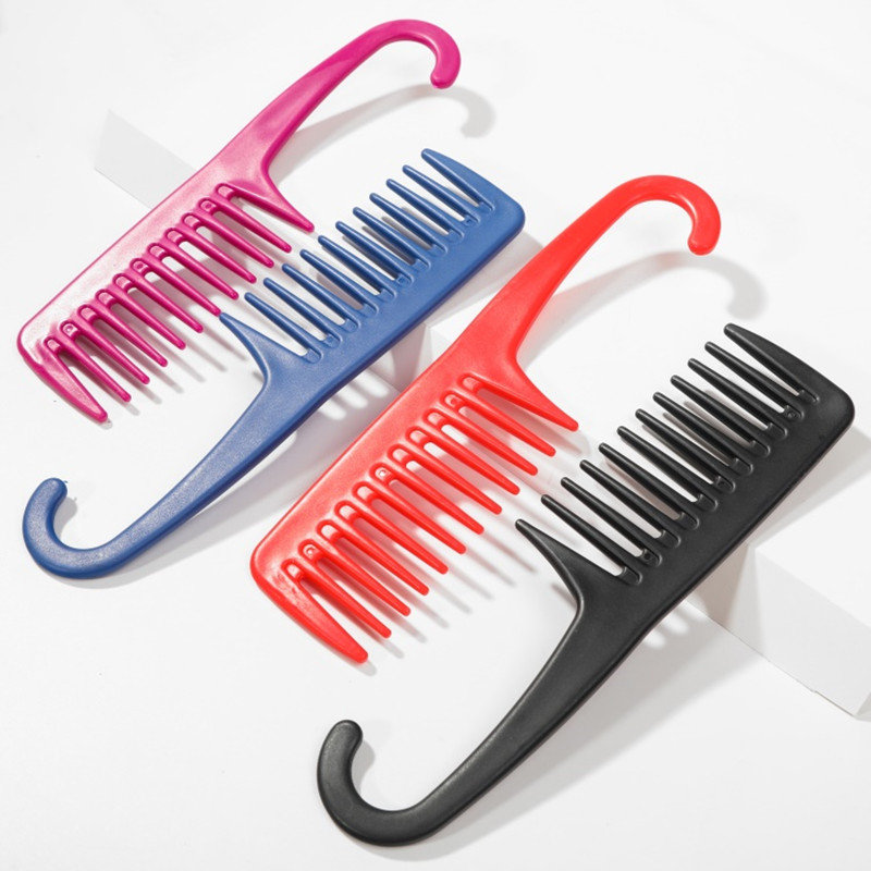 Factory direct sales of popular plastic colored wide-toothed curved hook hair care flat combs in foreign trade details Picture