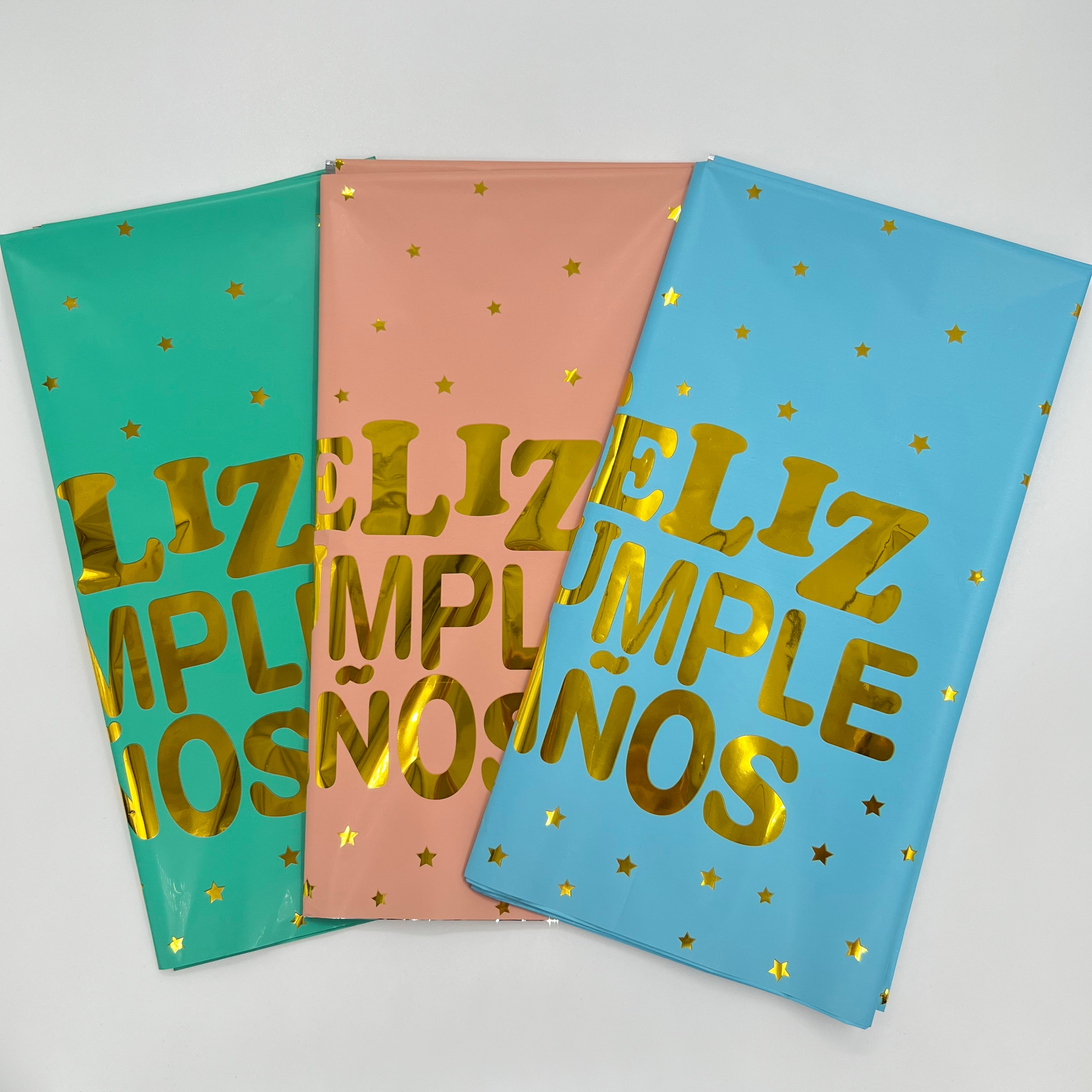 Colored paper with gold letters