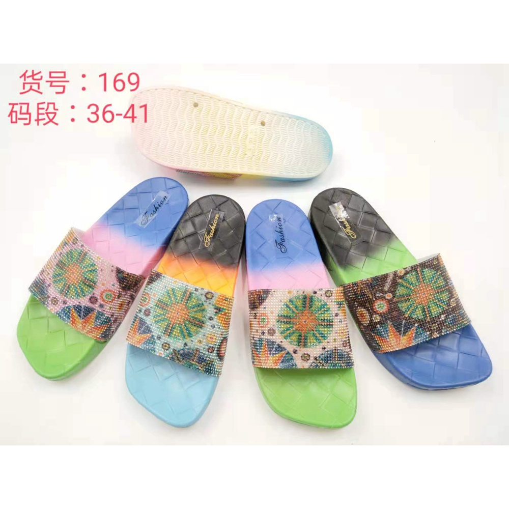 Women wearing colorful slippers outdoors at a cafe