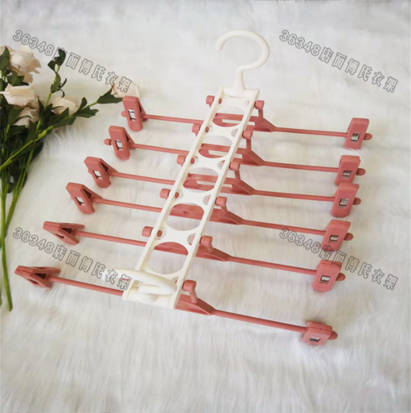 Trouser rack Trouser clip household trouser hanger Multi-layer magic trouser rack folding multi-function trouser skirt trackless trouser rack trouser clip household trouser rack storage clothes hanger JK hanger Multi-function trackless power skirt rack red and white thumbnail