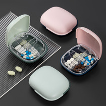 Portable clamshell pill box