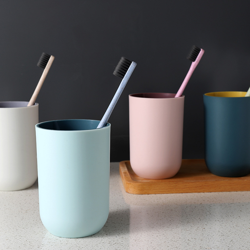 Two-color plastic toothbrush cup