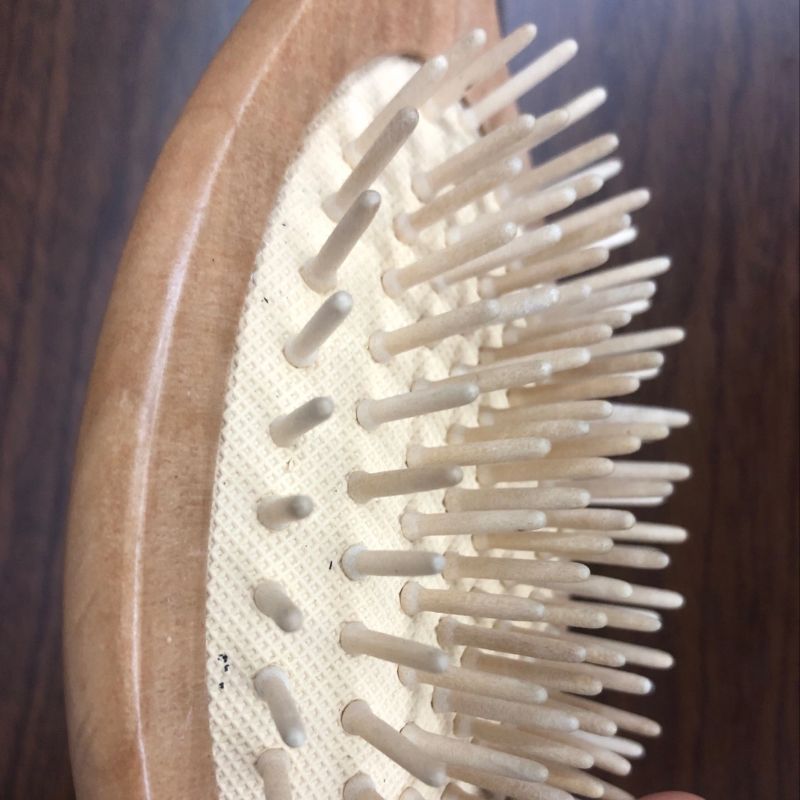 The log scalp massage oval comb is an air cushion comb with an oval shape details Picture