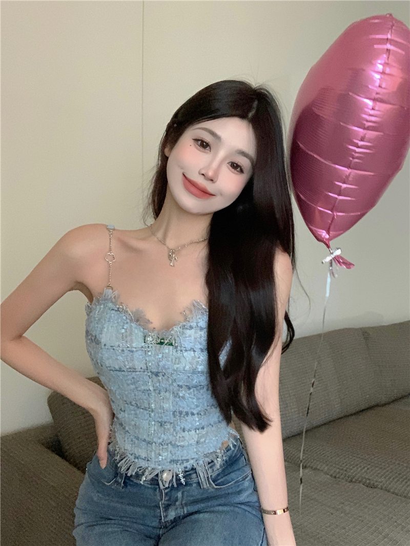 The blue fringed halter top is a sweet and spicy summer outfit for women. It has a pure and chic design and is paired with a short top inside pic 1