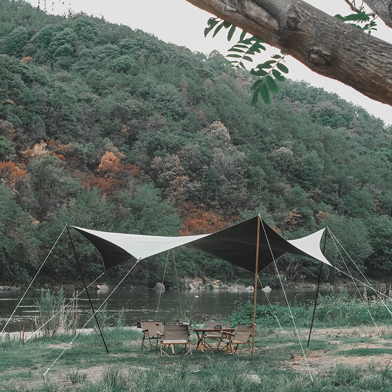 Xanuoduoji outdoor black rubber hexagonal canopy camping thickened rainproof, sunshade and portable simple canopy Application Scenario