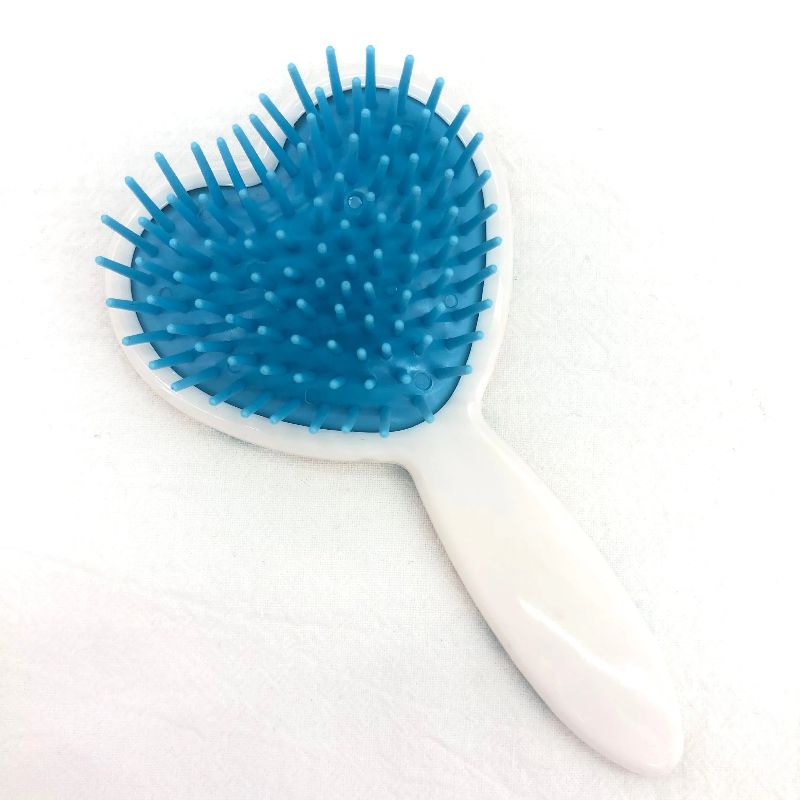 Heart-shaped air cushion massage comb, plastic massage anti-static comb, plastic printed cute airbag comb Specification image