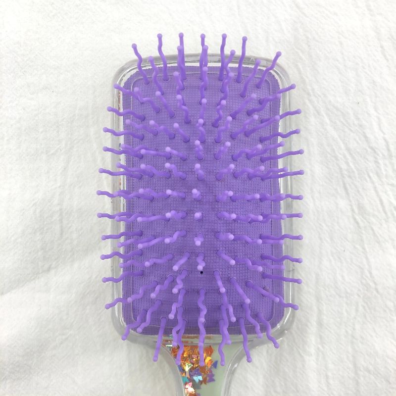 Oval transparent glitter powder air cushion massage comb, plastic massage anti-static comb, plastic printed cute airbag comb Application Scenario