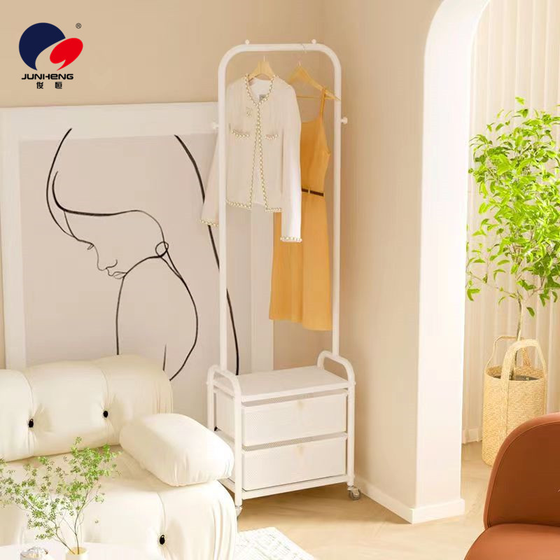 The floor-standing clothes rack for the bedroom is a household multi-layer organizing wonder. It is a storage rack for clothes and hats with drawers and an overnight clothes storage rack details Picture
