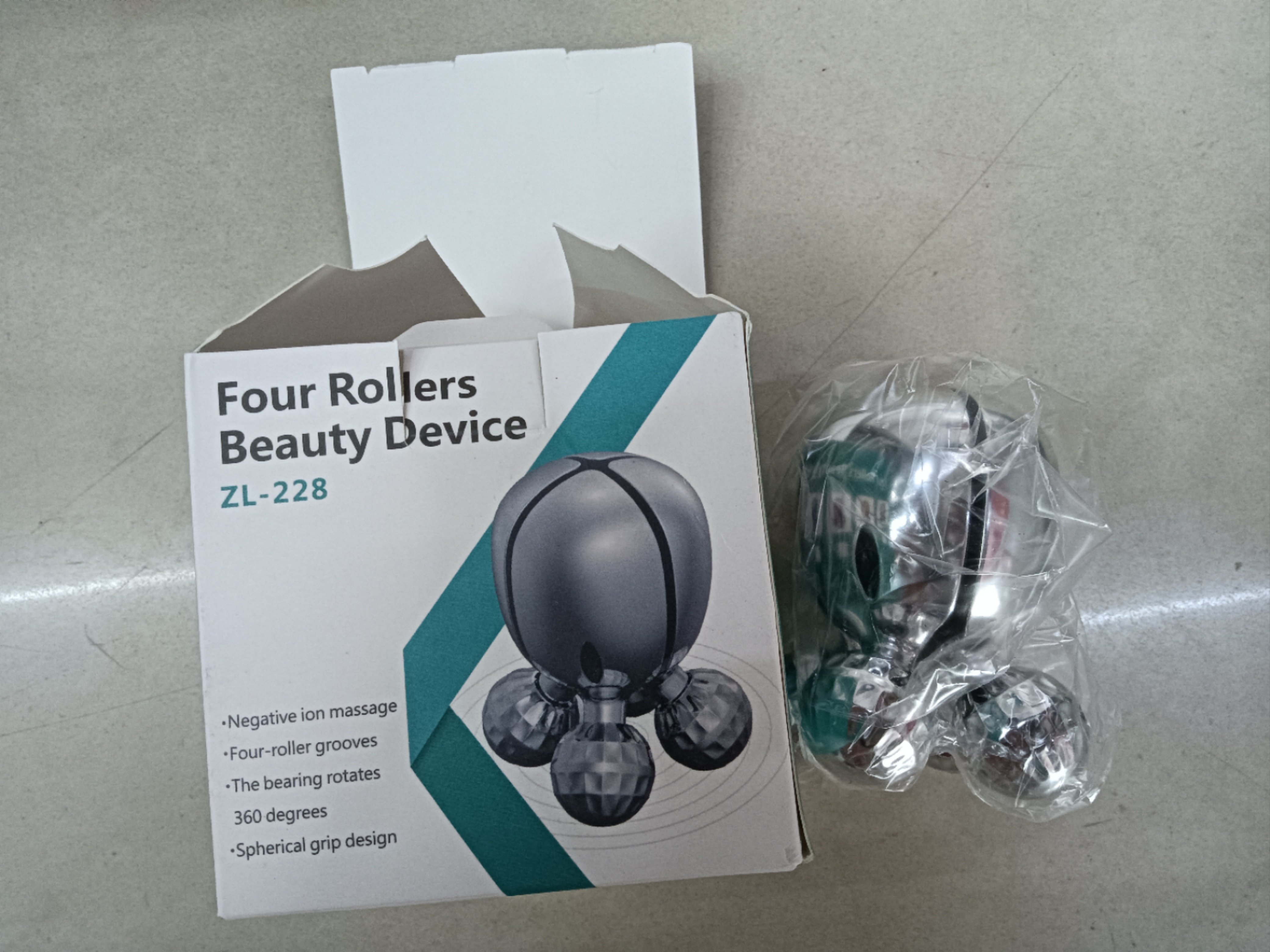 The ZL-228 four-roller massage device is a small massage device pic 1