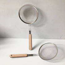 Wooden handle slotted spoon