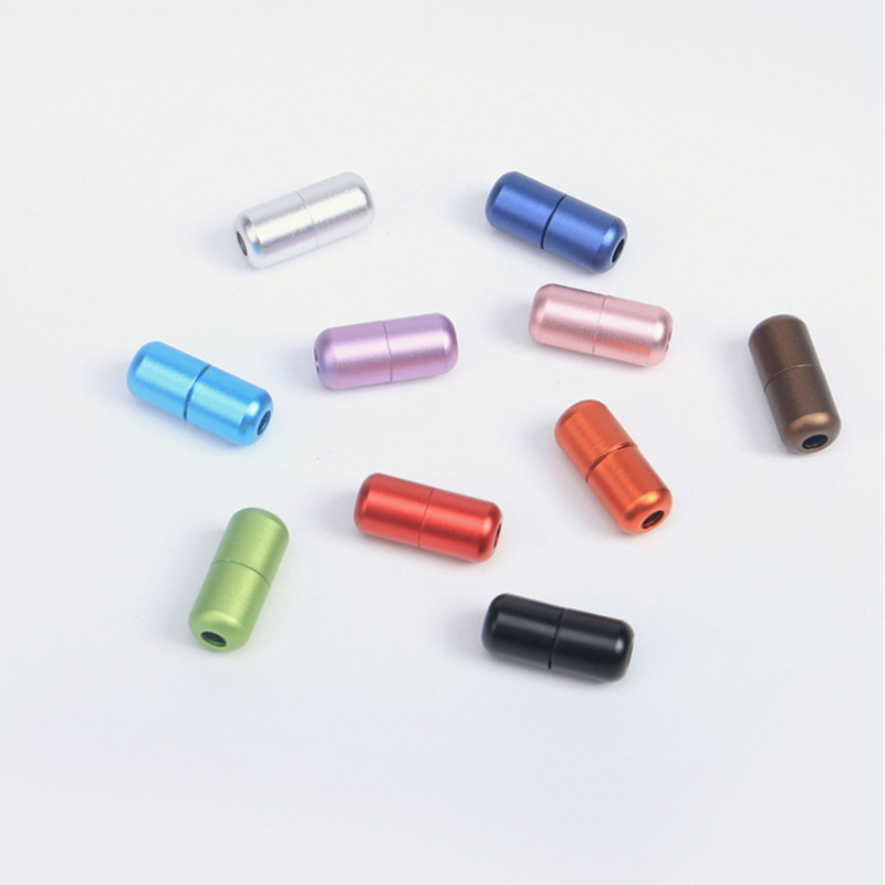 Capsule shoelace buckle