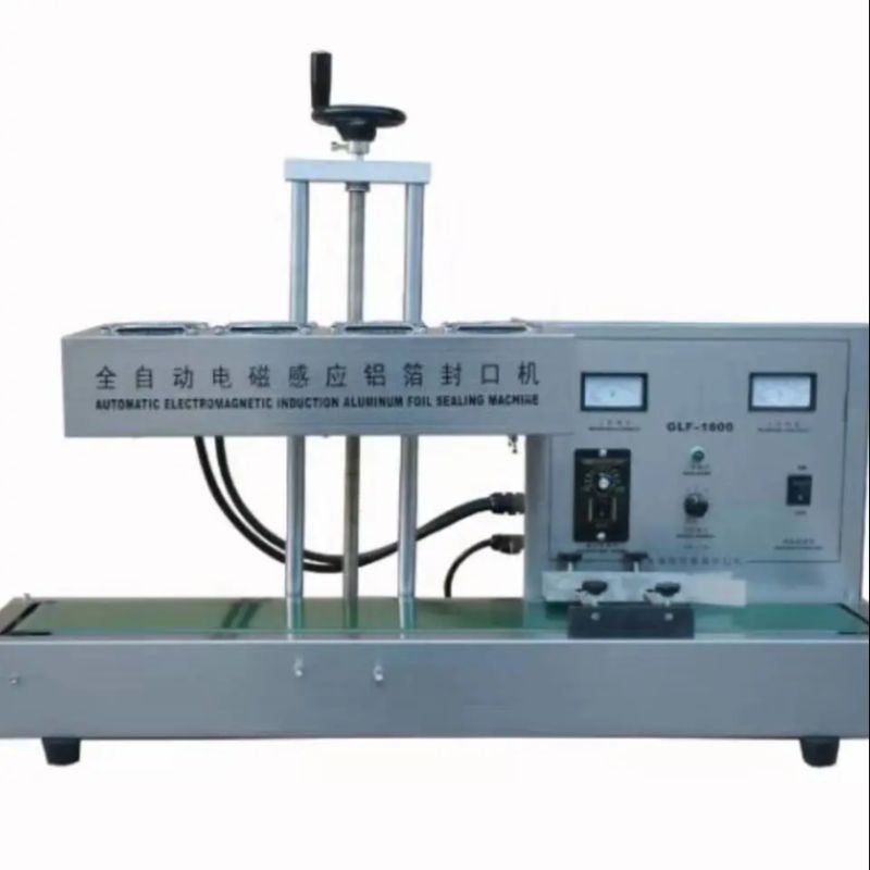 Guangxin Packaging Machinery Equipment, a well-established physical store, offers high-quality and reasonably priced automatic aluminum foil induction sealing machines details Picture