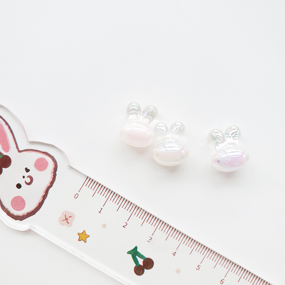 Little rabbit head bead acrylic two-color seven-color magic cartoon candy color bead middle bead hair string material pic 3