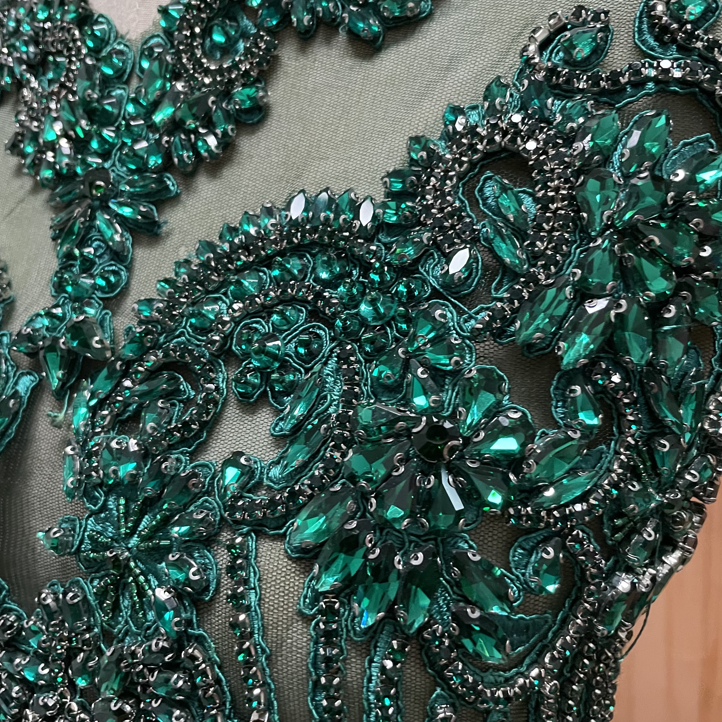 Hand-stitched beaded wedding dresses and evening gowns are decorated with lace decals details Picture