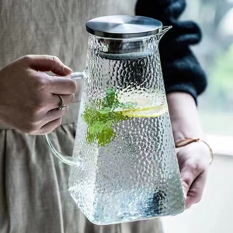 A Glass Pot With Four Corners