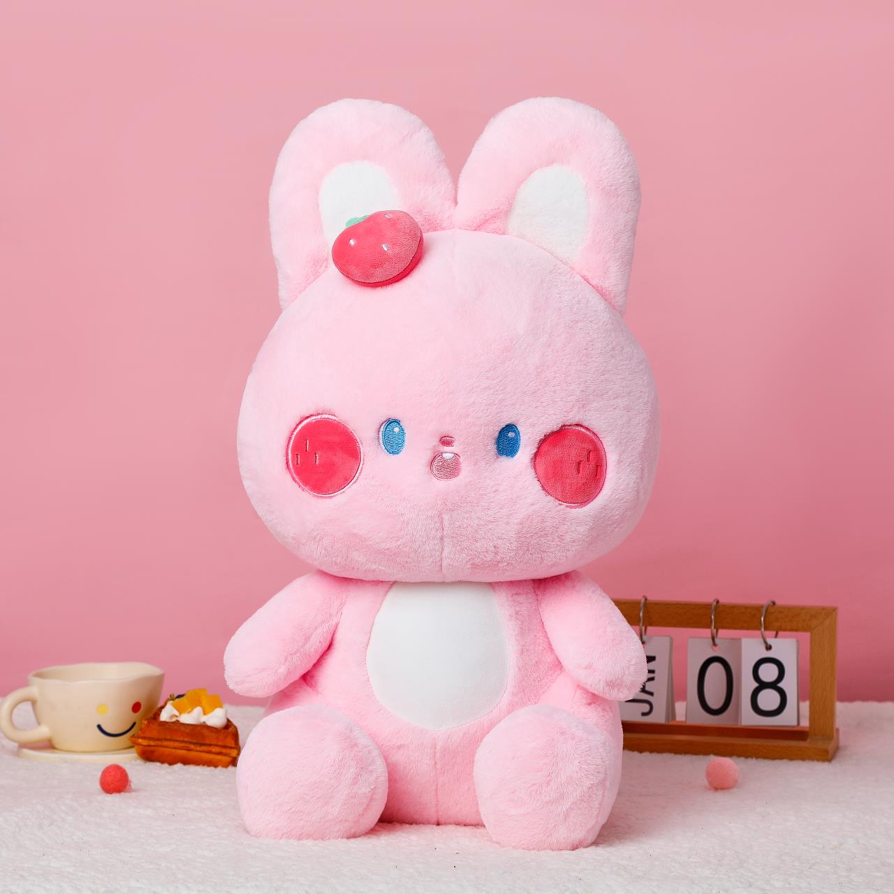 The cute strawberry pink rabbit plush pillow is decorated with a cute shape, is skin-friendly and delicate, and has a smooth touch pic 4
