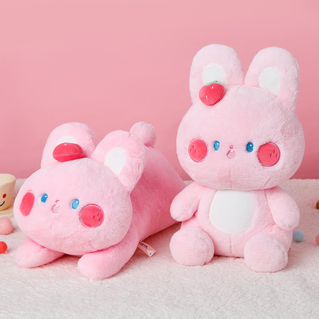 The cute strawberry pink rabbit plush pillow is decorated with a cute shape, is skin-friendly and delicate, and has a smooth touch pic 3