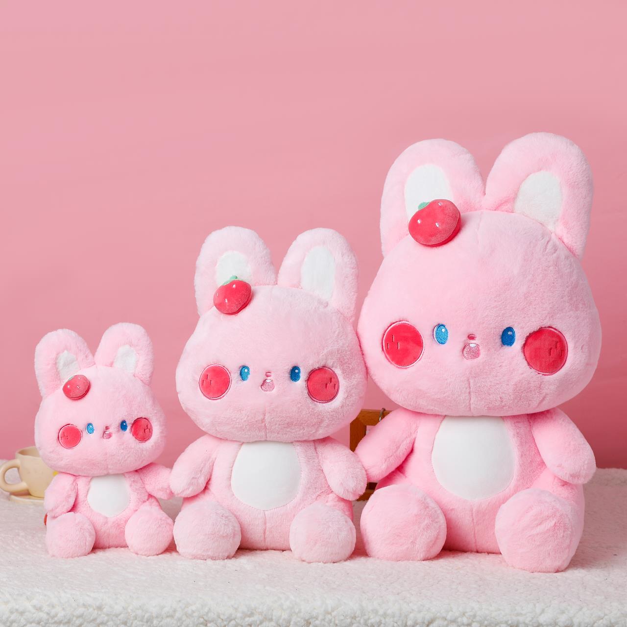 The cute strawberry pink rabbit plush pillow is decorated with a cute shape, is skin-friendly and delicate, and has a smooth touch pic 2