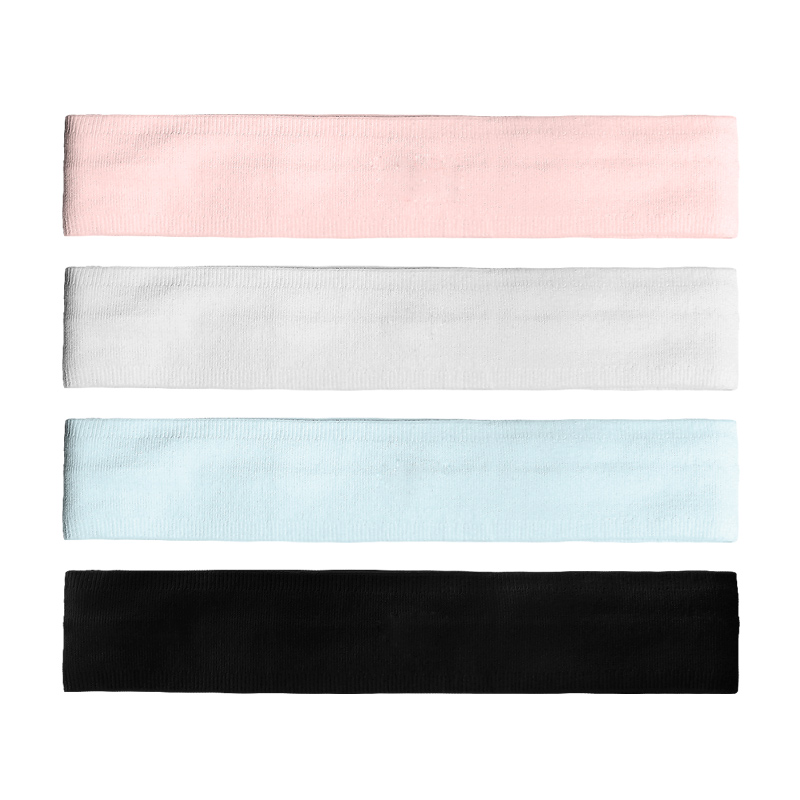 Close-up of woman meditating with headband in peaceful setting