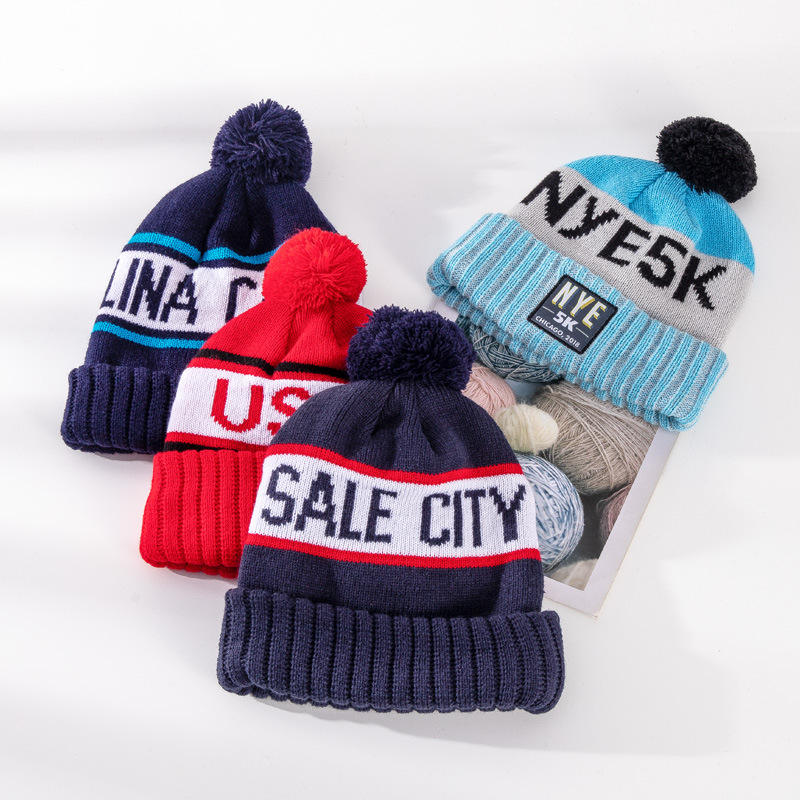 Wholesale Custom Beanie Embroidery Logo Woven Label 100% Acrylic Pompom Beanie Hat Knitted Beanie In Winter Hat
