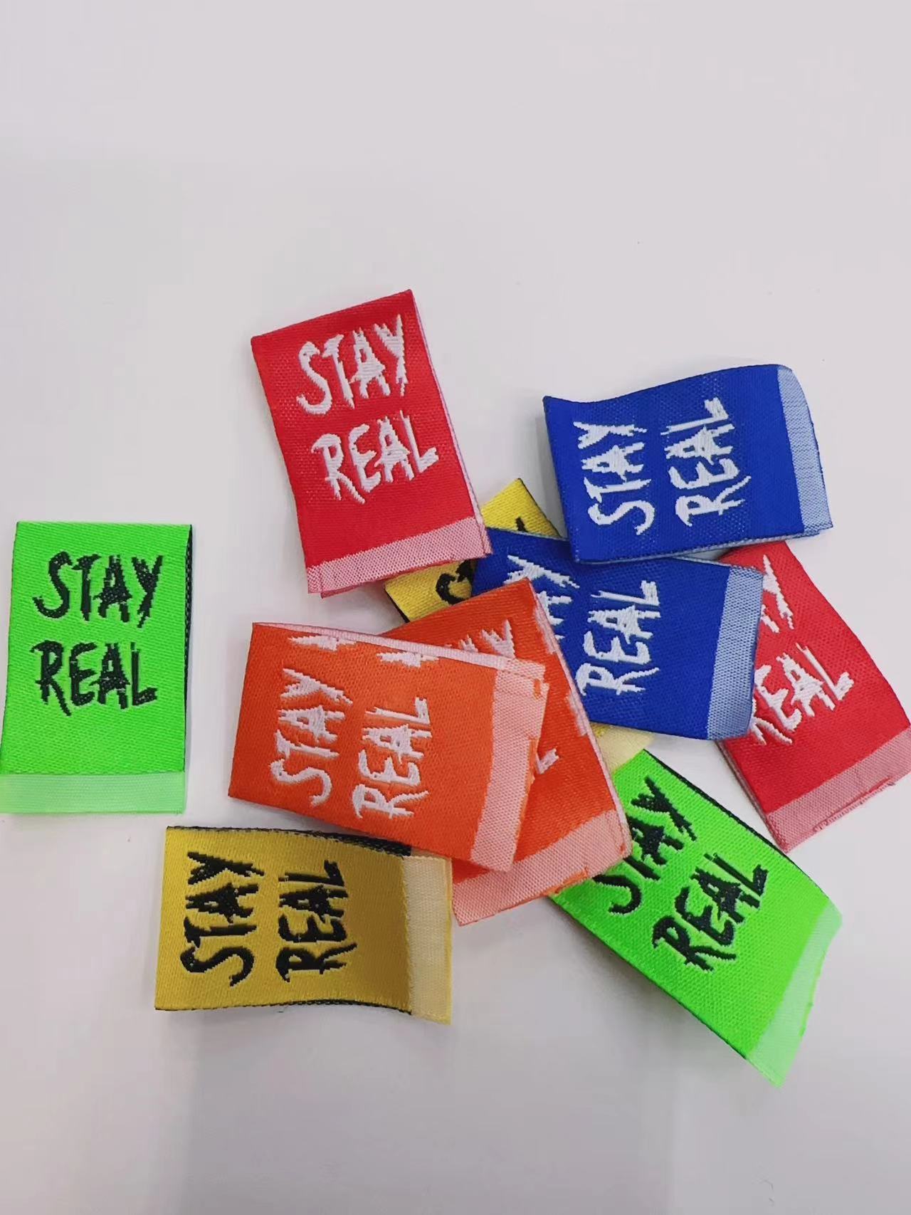 Stay Real Clip Labels White On Red, White On Blue, White On Orange, Black On Green, Black On Yellow details Picture