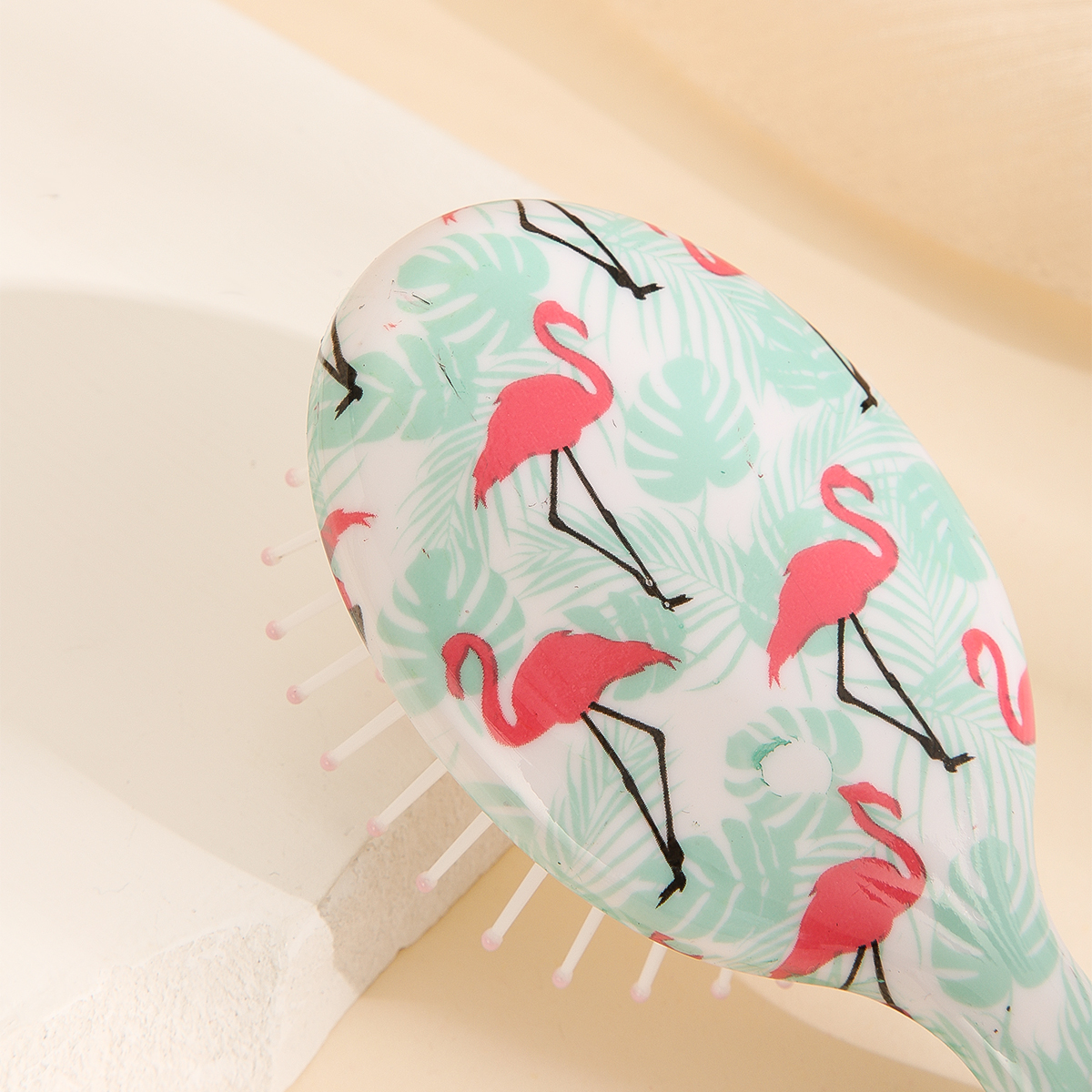 The small and mini airbag comb for women is not harmful to the scalp. It is a plastic comb and a cute cartoon airbag comb pic 1