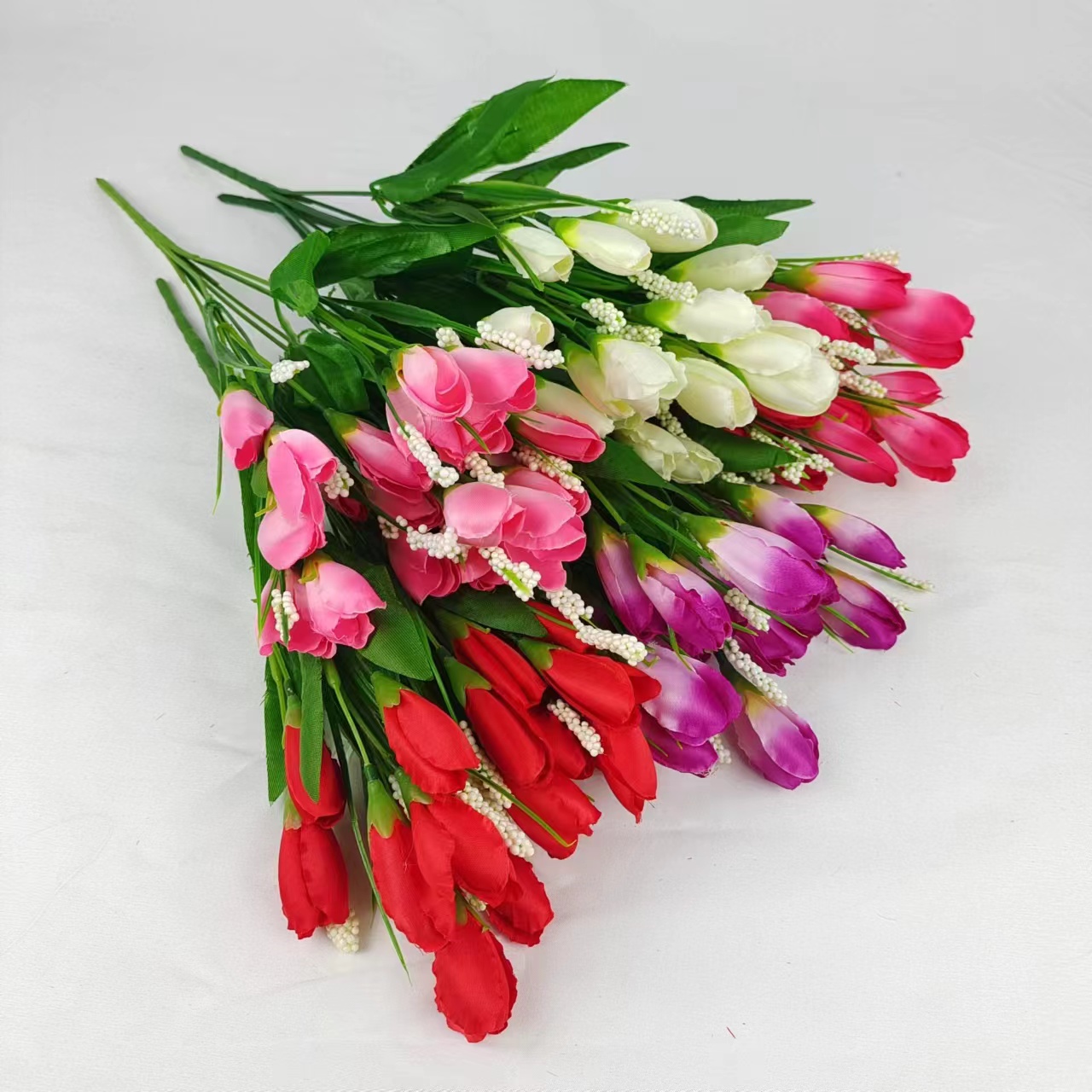 Factory direct sales 7 fork 21 head small magnolia simulation plastic flower home wedding decoration shooting props outdoor plant wall decoration thumbnail