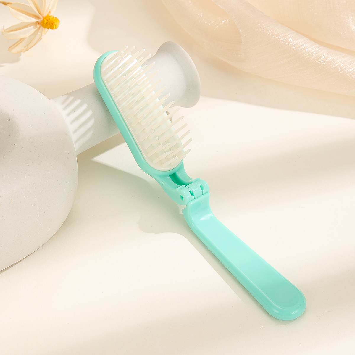 Plastic folding comb, hair comb, portable mini multi-functional travel soft-toothed massage comb Item Picture