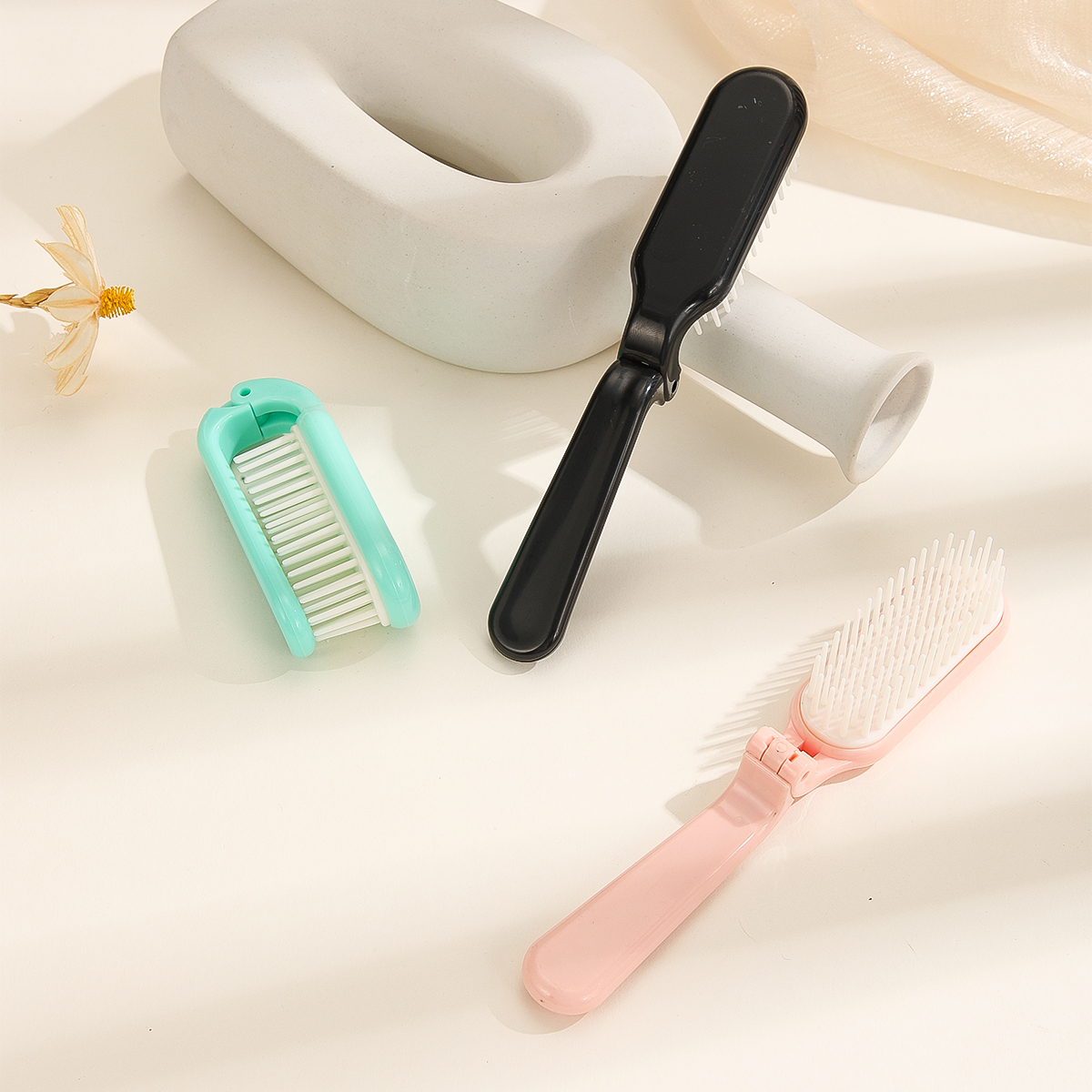 Plastic folding comb, hair comb, portable mini multi-functional travel soft-toothed massage comb Specification image