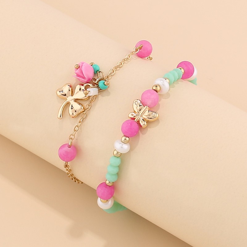 Hot selling explosive colorful rose alloy clover pendant hand string creative butterfly natural stone rice beads fashion bracelet