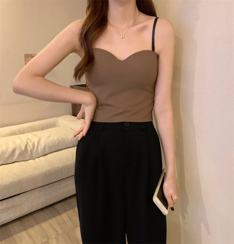 For winter women, wear a French-style small halter top with a cushioned base layer inside and a sleeveless, slimming short top outside pic 4