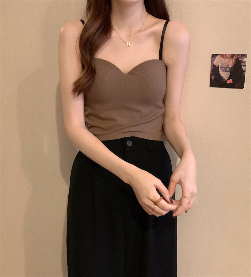 For winter women, wear a French-style small halter top with a cushioned base layer inside and a sleeveless, slimming short top outside pic 2